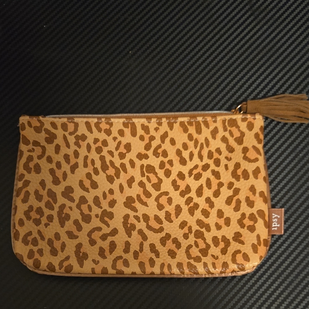Ipsy Tan and Brown Animal Print Pouch with Tassel